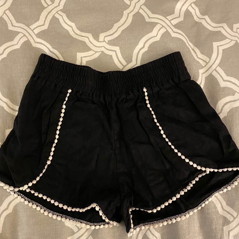 Cute black shirt with white ppm ppm trim
